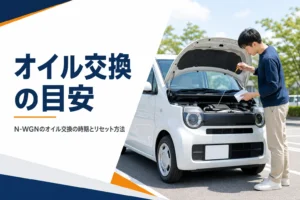 軽自動車のエンジンオイルの量を確かめる様子
